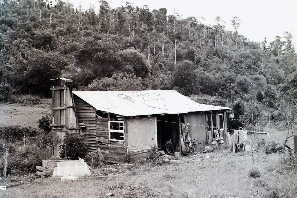 14a Hut with Amazon Acres painted on the roof. 1978